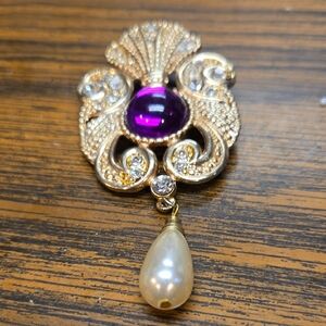 Elegant Gold and Purple Brooch with Pearl Drop